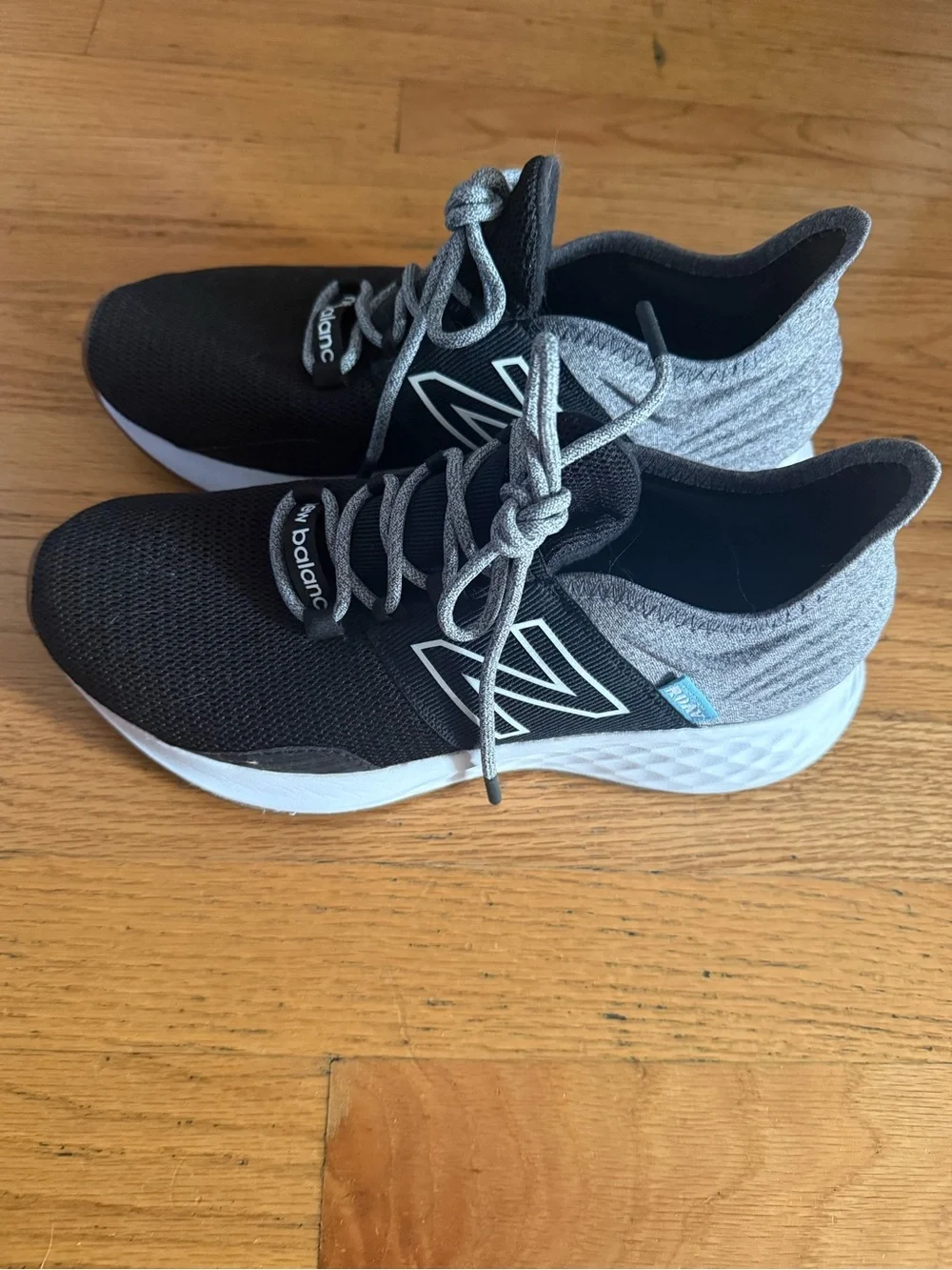 New Balance Women’s Black & Gray Athletic Sneakers with White Midsole
